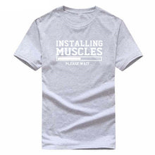 Load image into Gallery viewer, INSTALLING MUSCLES funny T-shirt