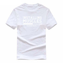 Load image into Gallery viewer, INSTALLING MUSCLES funny T-shirt