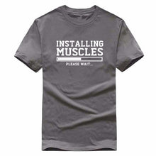 Load image into Gallery viewer, INSTALLING MUSCLES funny T-shirt