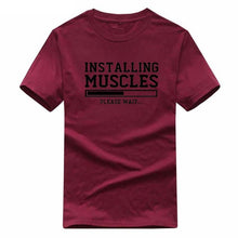 Load image into Gallery viewer, INSTALLING MUSCLES funny T-shirt
