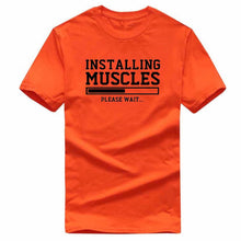 Load image into Gallery viewer, INSTALLING MUSCLES funny T-shirt