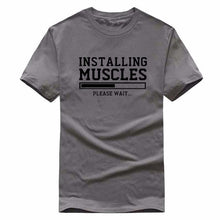 Load image into Gallery viewer, INSTALLING MUSCLES funny T-shirt